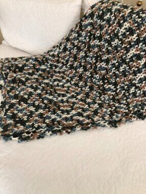 Handmade crocheted brown, blue and white afghan